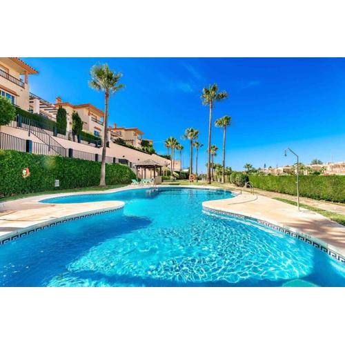 4 Bed detached villa close to golf & beach with shared pool.