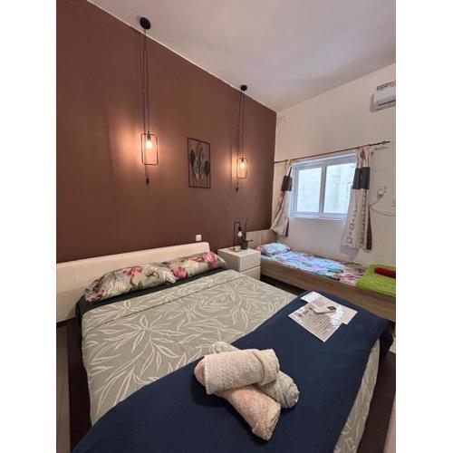 4 Person Sliema Spacious Room Airconditioned and Self Check