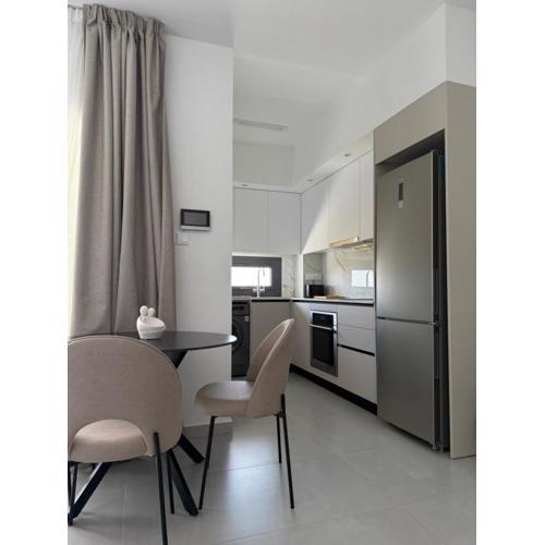 ΘΕΑ 5 Comfortable 1BR and 2BR Apartments