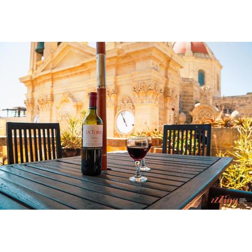 A Holiday Home Duplex in a Gozo Village Square