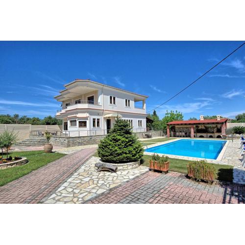 Acharavi Beach Villa by PosarelliVillas
