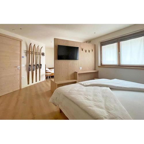 Alpine Rooms and Suites Livigno - Camana Noa -