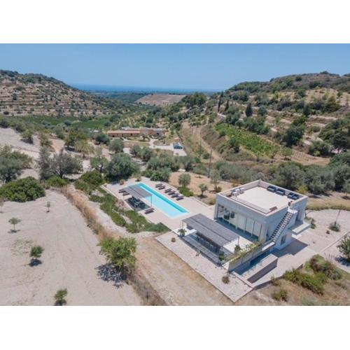 Amazing property of 2 villas on a land sea view