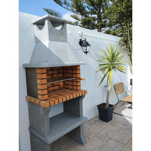 Apartamento con barbacoa y porche