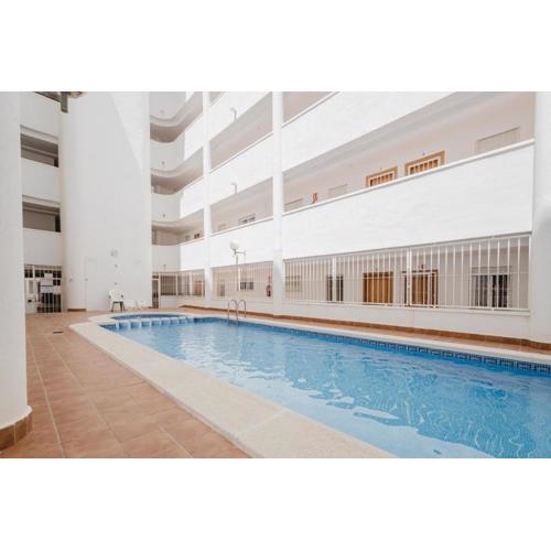 Apartamento con Piscina Centrico