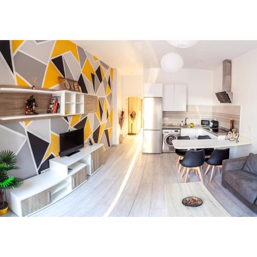 Apartamentos Pájaro Amarillo y Turquesa