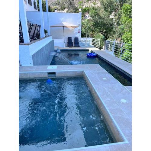 Apartment D with heated swimming pool, jacuzzi, waterfall, heating is extra