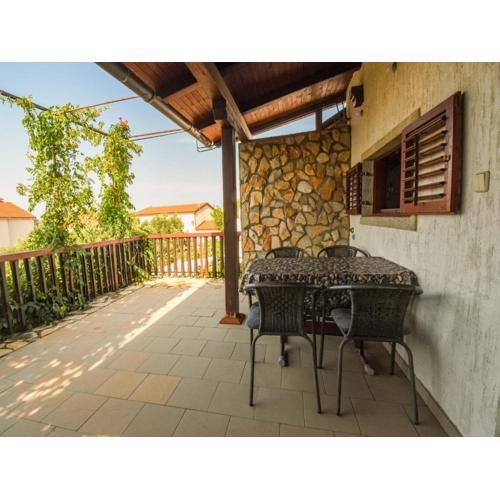 Apartment Kostanjevac with Terrace and Sea View