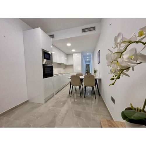 Apartment near Playa de Cura with a rooftop swimming pool