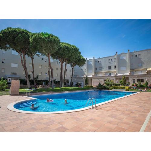 Apartment with community pool and garden