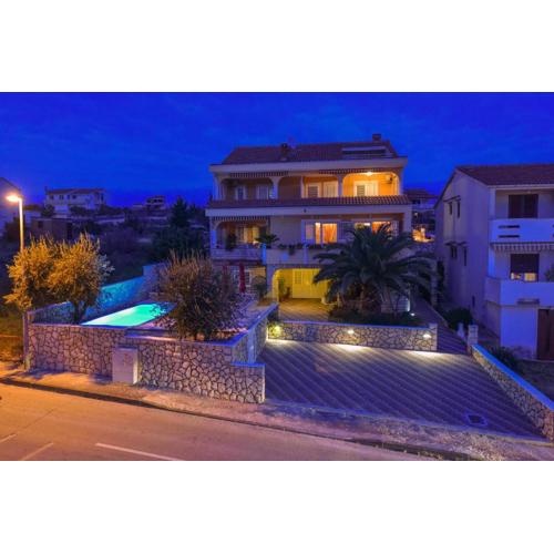 Apartments and rooms with a swimming pool Novalja, Pag - 9334