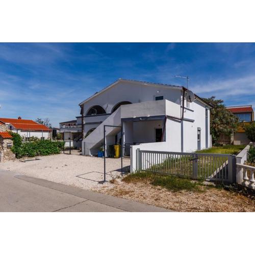 Apartments by the sea Vir - 23250