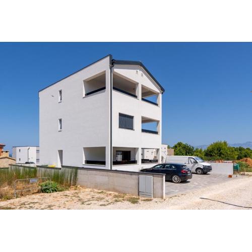Apartments with a parking space Vir - Lozice, Vir - 23514