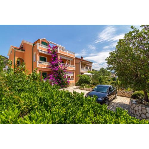 Apartments with parking spaces Barbat, Rab - 20080