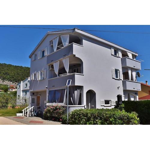 Apartments with parking spaces Barbat, Rab - 24547