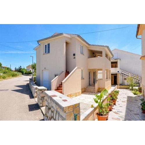 Apartments with parking spaces Novalja, Pag - 23663