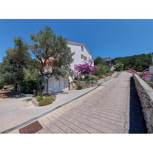Apartments with parking spaces Palit, Rab - 24108