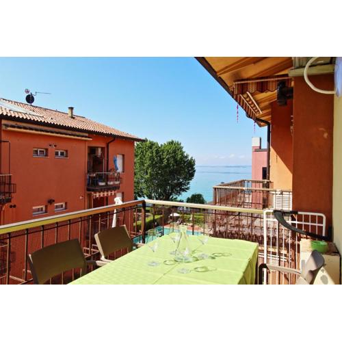 Appartamento bellissima vista lago, spiaggia privata,nuovo
