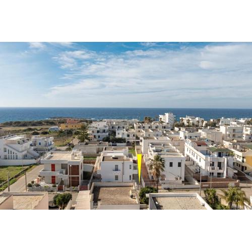 Appartamento climatizzato con patio esterno privato a 150 m dal mare