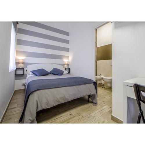 Appartamento con 2 camere e 2 bagni in centro con parcheggio