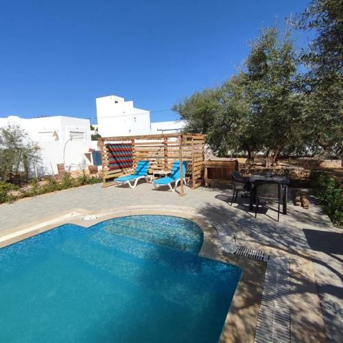 Appartement Les Oliviers avec piscine proche du lagon