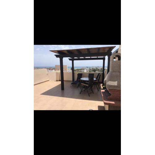 Atico con piscina privada y vistas al mar