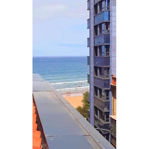 Ático con terraza en playa de San Lorenzo
