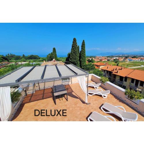 Attico Deluxe Vista Lago - Al Glicine Apartments