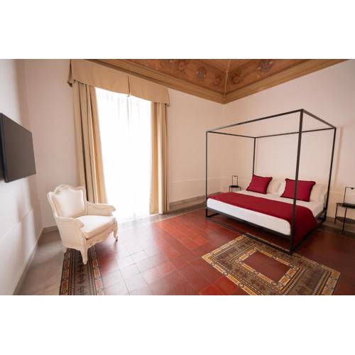 B. Sicilian Charming Stay Historical Suite