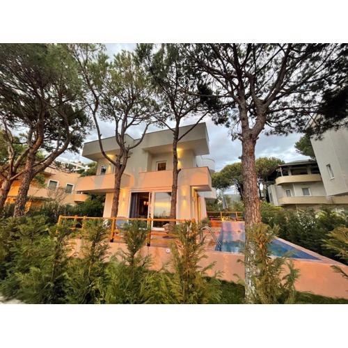 Beachfront villa in Qerret beach with a private pool