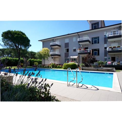 Beachside flat with shared pool
