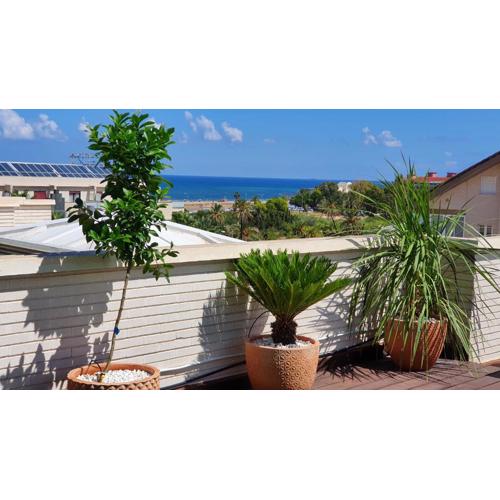 Beau Penthouse avec vue mer