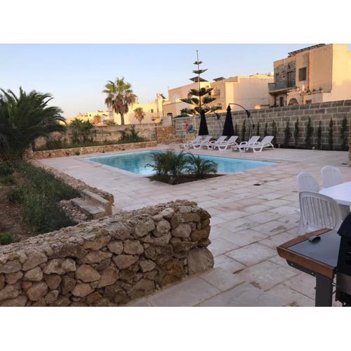 Beautifully Converted Farmhouse Villa In Gozo with Large Pool and Outdoor Area