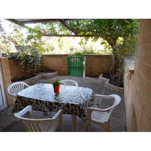 Bilocale con veranda giardino al mare in Baia Verde Gallipoli