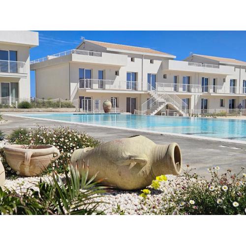 Bilocale in resort con piscine