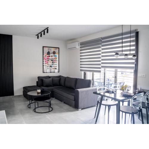 Black & White 2BR Apt steps from Mavili Square