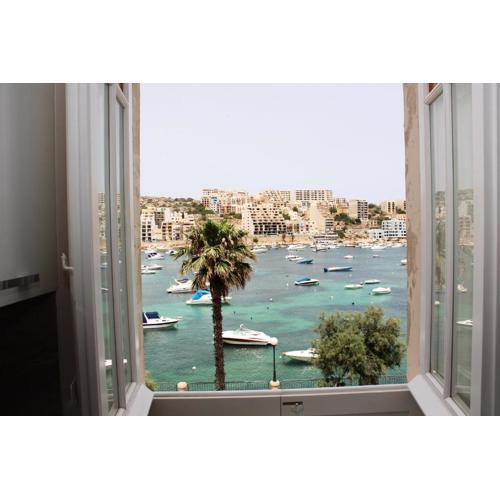 Blue Harbour 3 bedroom seafront apartment with large yard on the promenade - by Getawaysmalta
