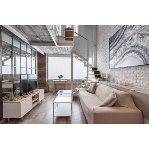 Bright duplex loft next to the city center by REMS