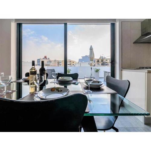Bugibba Deluxe Penthouse with terrace & communal swimming pool