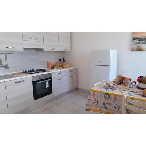 Casa per sei a San Foca LL07 con due balconi