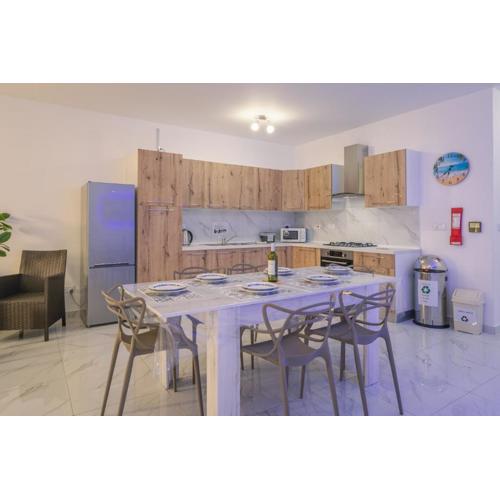 Central Comfort Apartment - Steps From All Amenities