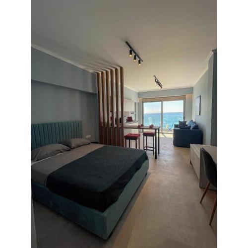 Charaki Sea Breeze Modern Studio with a Refreshing Balcony View