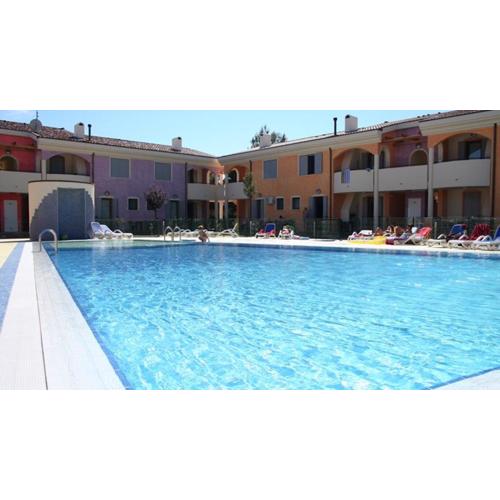 Colorful apartment with fenced garden and fireplace