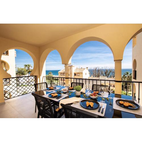 Contemporary loft style apartment with amazing sea views and with direct access to the beach from the community