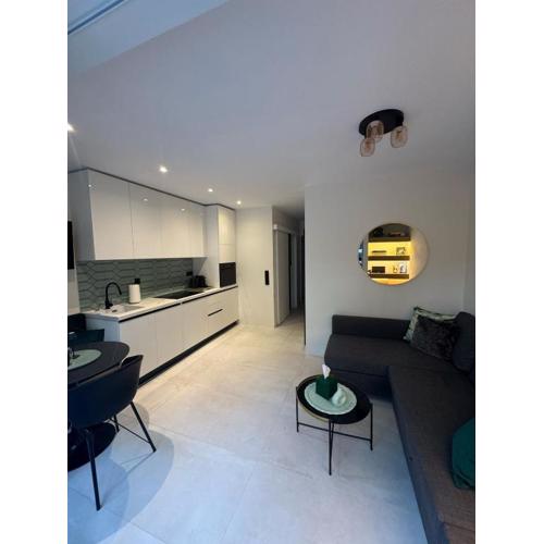 Cosy apartment with shared pool and garden