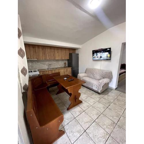 Cozy 5-Bed Home with Balcony