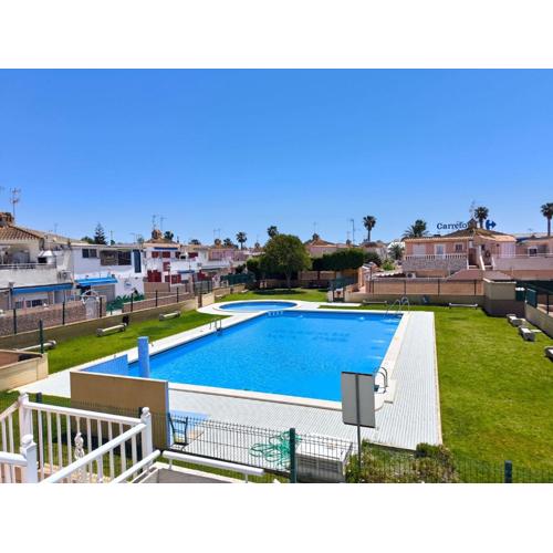 Cozy Bungalow with Private Terrace and Communal Pool in Torrevieja