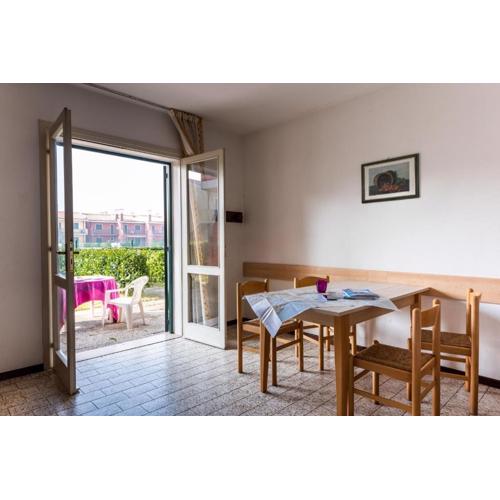 Cozy house with garden and pool in Bibione