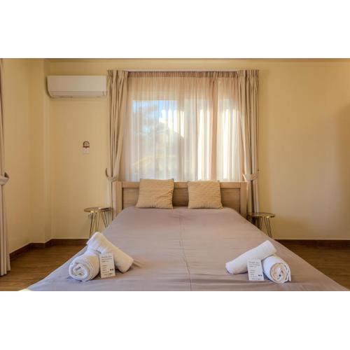 Danaos Seaside Suite 002 with Pool in Tourist Area