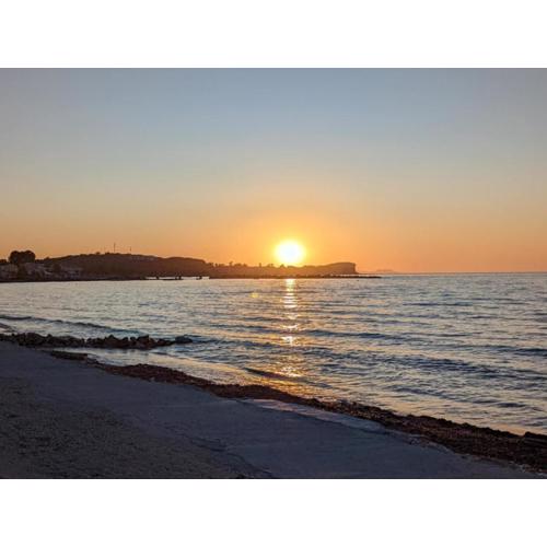 Dolphin Studios-Next to the Beach by Lauren